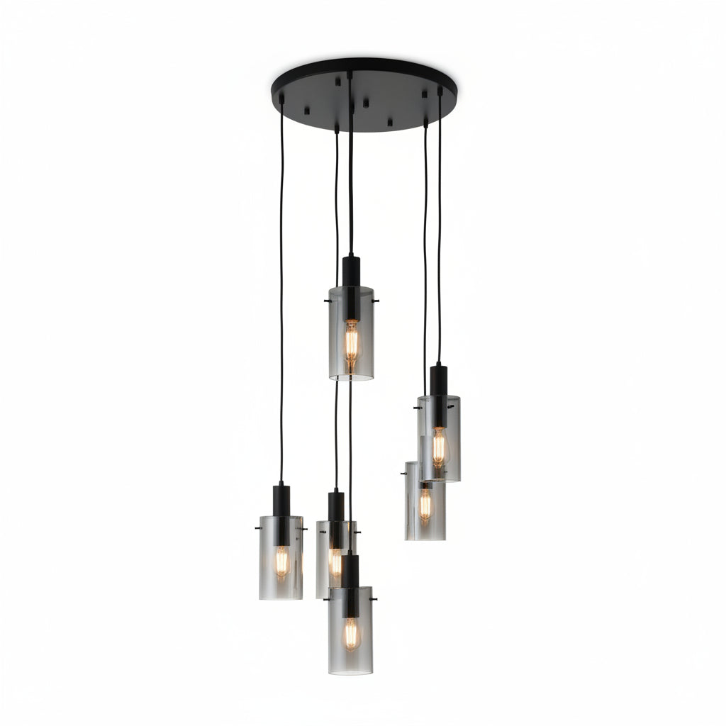 Modern pendant light fixture with glass shades on a ceiling.